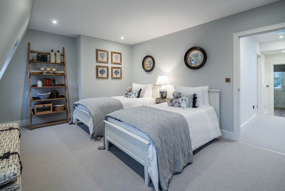 Photo of a traditional gender neutral kids' bedroom in London with grey walls, carpet and grey floors.