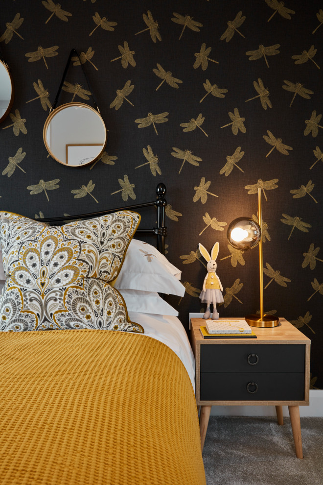 Photo of a medium sized contemporary children’s room for girls in London with multi-coloured walls, carpet, grey floors and wallpapered walls.