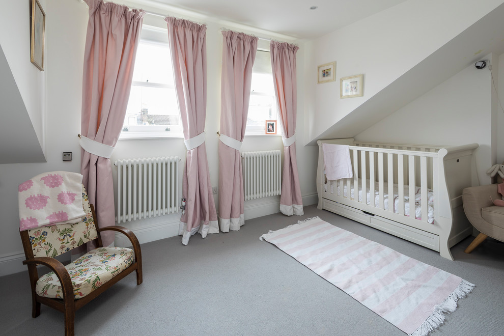 На фото: комната для малыша среднего размера в классическом стиле с бежевыми стенами, ковровым покрытием и бежевым полом для девочки с