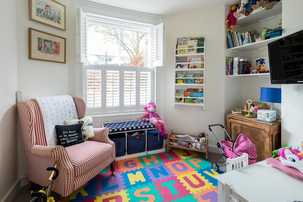 This is an example of a medium sized classic gender neutral kids' bedroom in London with beige walls, ceramic flooring and grey floors.