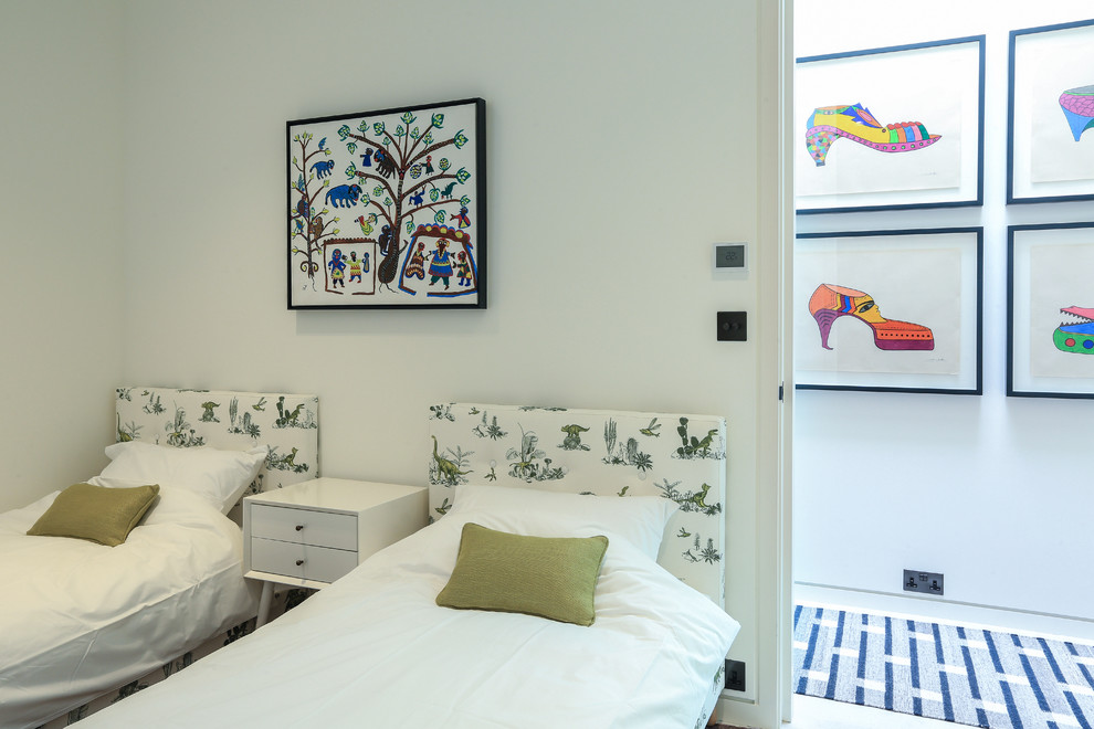 Contemporary gender neutral children’s room in London with white walls.