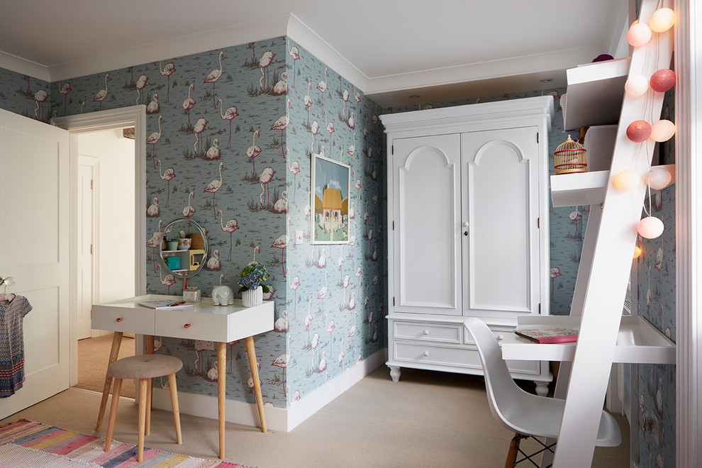 Inspiration for a transitional girl kids' bedroom remodel in London with blue walls