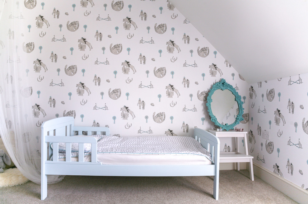 Country gender-neutral childrens' room photo in Hertfordshire with white walls