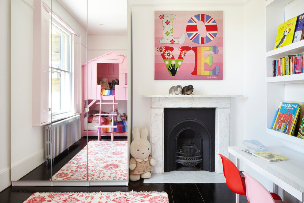 Inspiration for an eclectic toddler’s room for girls in London with white walls.