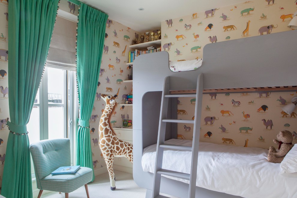 Photo of a traditional gender neutral children’s room in London with multi-coloured walls, carpet and beige floors.