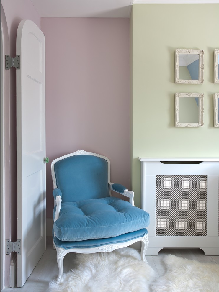 Inspiration for a large timeless girl painted wood floor kids' room remodel in London with multicolored walls