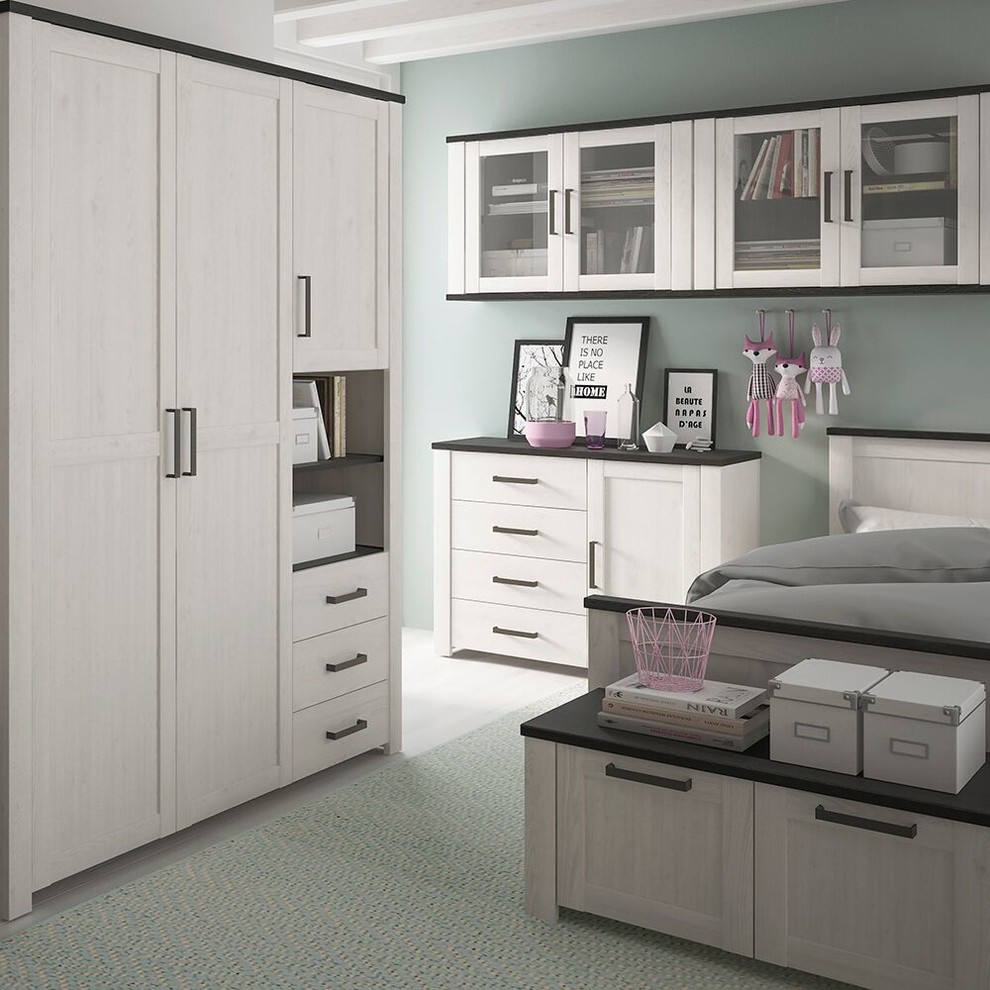 Contemporary teen’s room for girls in Other with green walls and laminate floors.