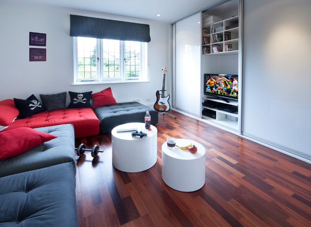 Low level modular seating with TV concealed behind sliding doors