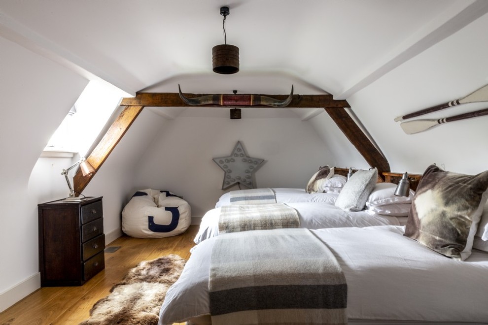 Photo of a medium sized classic kids' bedroom in Devon with beige walls, medium hardwood flooring and brown floors.