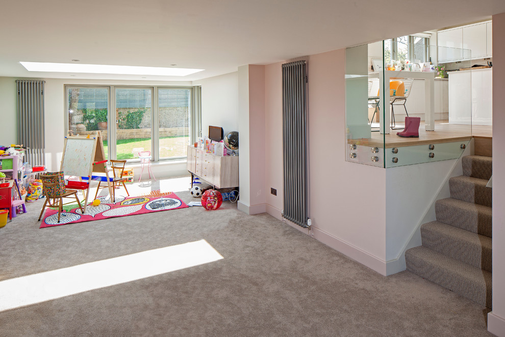 Design ideas for a contemporary kids' bedroom in Hertfordshire with white walls and carpet.