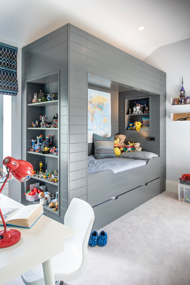Réalisation d'une chambre d'enfant de 4 à 10 ans design de taille moyenne avec moquette et un sol gris.