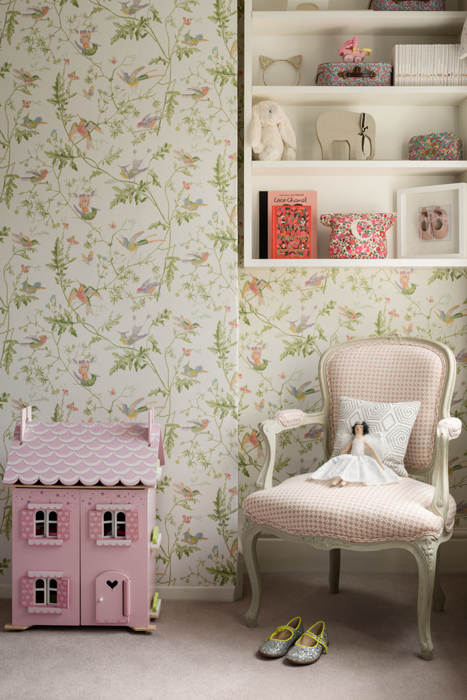 This is an example of a traditional children’s room for girls in London with carpet and grey floors.