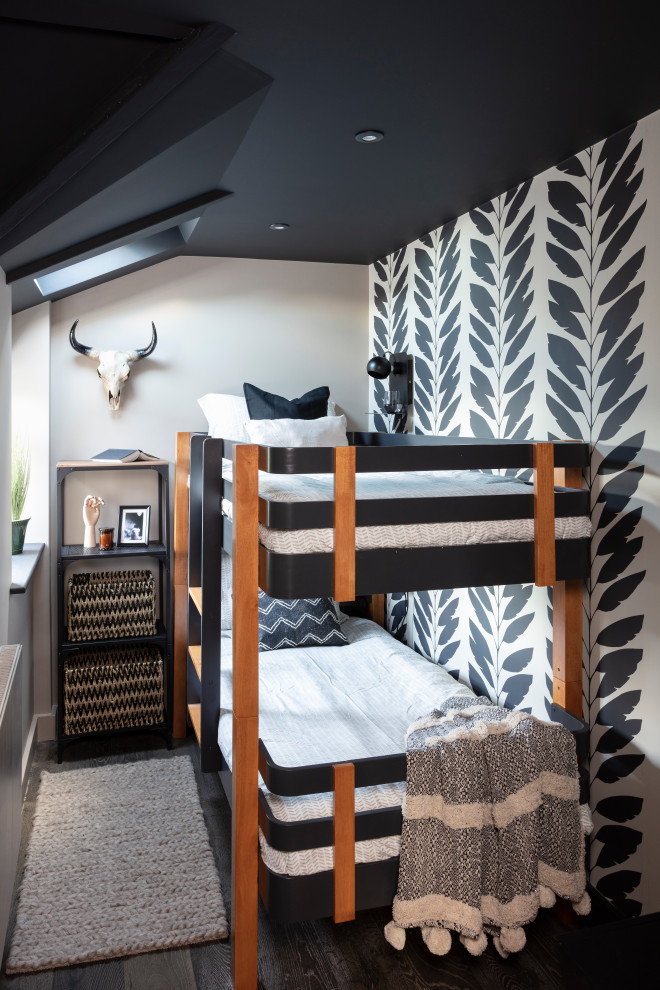 Photo of a medium sized contemporary children’s room for boys in Other with dark hardwood flooring, brown floors and white walls.