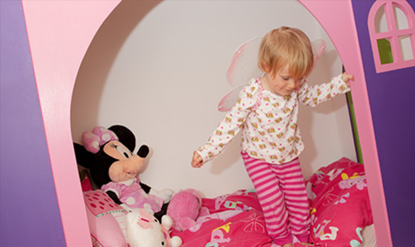 Inspiration for a contemporary children’s room for girls in Manchester with pink walls.