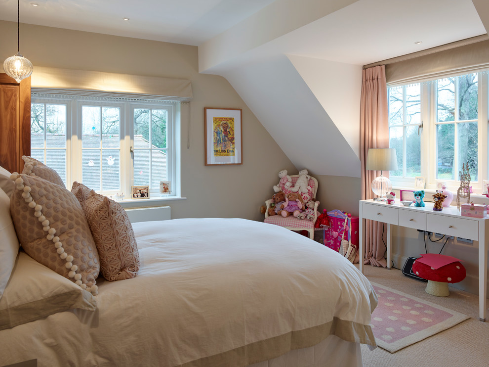 Inspiration for a medium sized contemporary children’s room for girls in Sussex with beige walls and carpet.