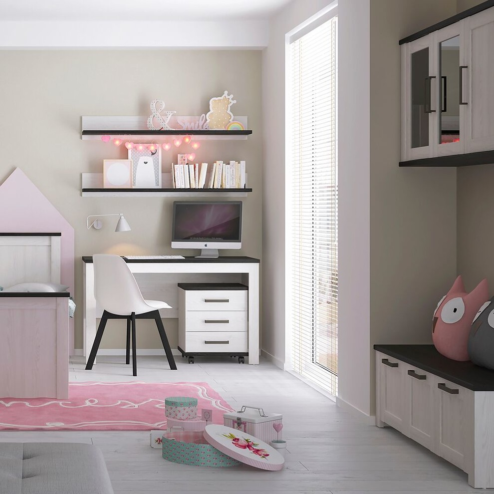 Inspiration for a contemporary teen’s room for girls in Other with green walls and laminate floors.