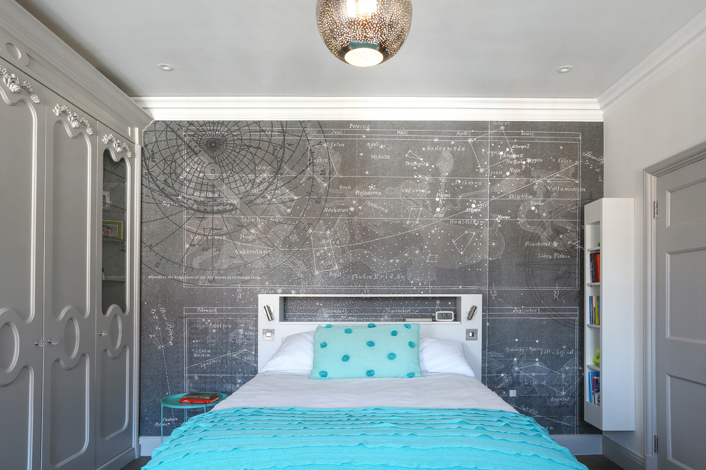Design ideas for a small contemporary gender neutral children’s room in London with grey walls.