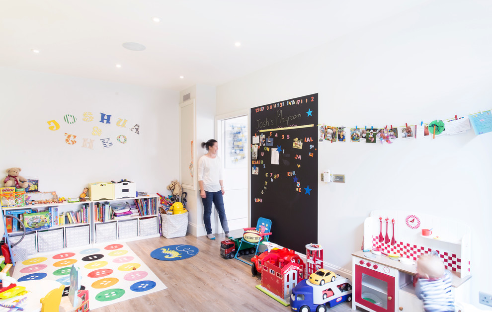 Photo of a contemporary gender neutral kids' bedroom in London.