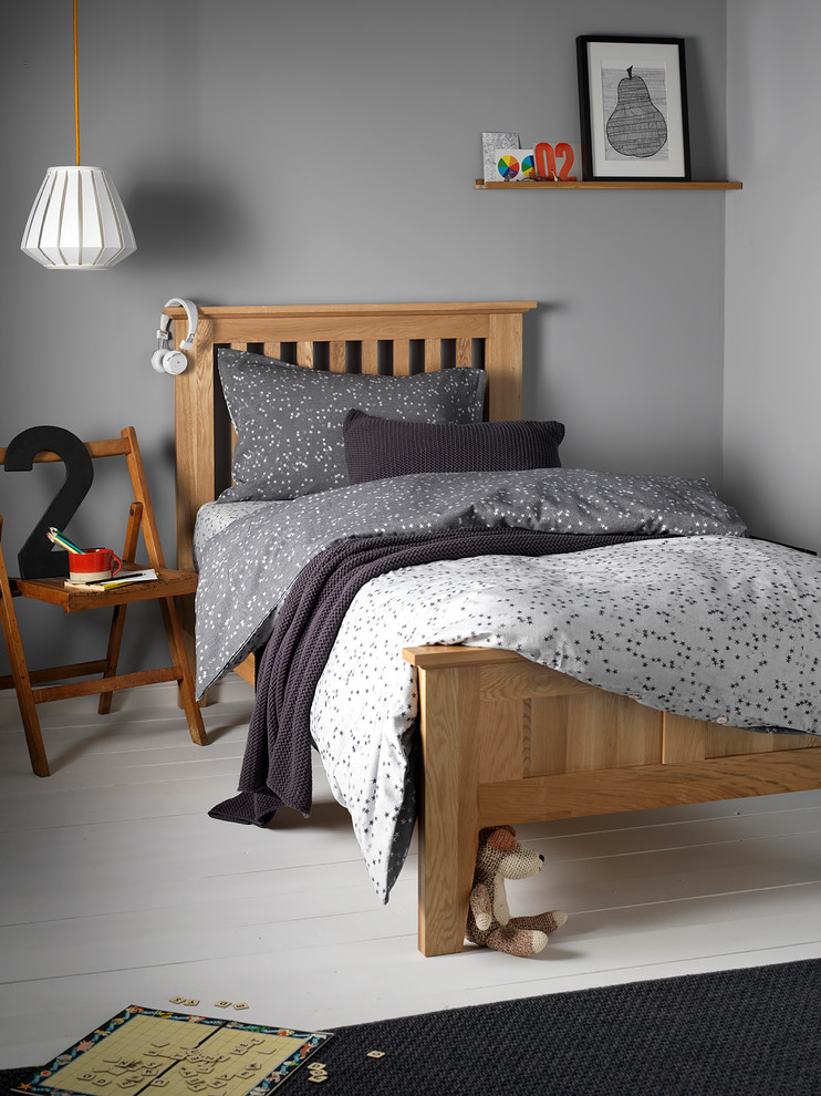Design ideas for a contemporary kids' bedroom in London with grey walls and painted wood flooring.