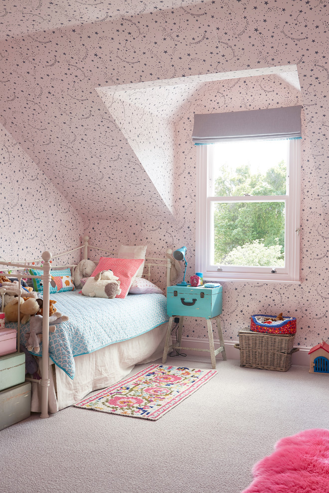 Design ideas for a classic children’s room for girls in London with carpet and pink walls.
