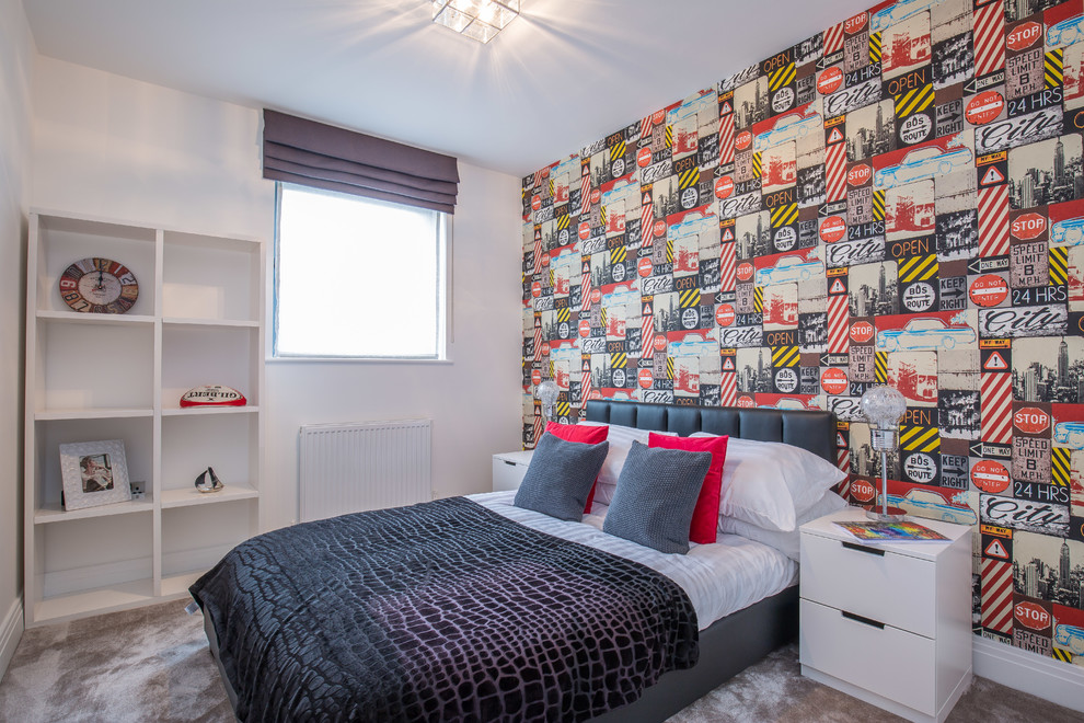 This is an example of a medium sized traditional children’s room for boys in Hertfordshire with multi-coloured walls, carpet and grey floors.