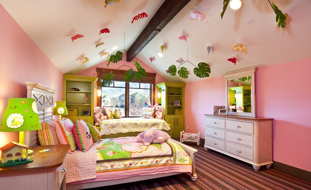 Inspiration for an eclectic girl carpeted and multicolored floor kids' room remodel in Salt Lake City with pink walls