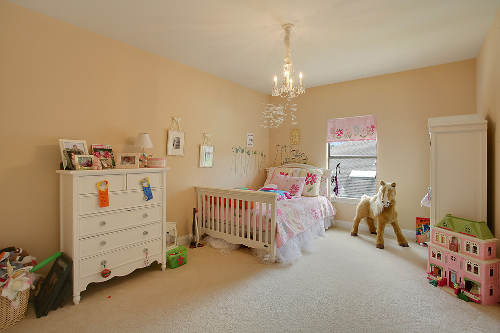 This is an example of a contemporary kids' bedroom for girls in New Orleans.