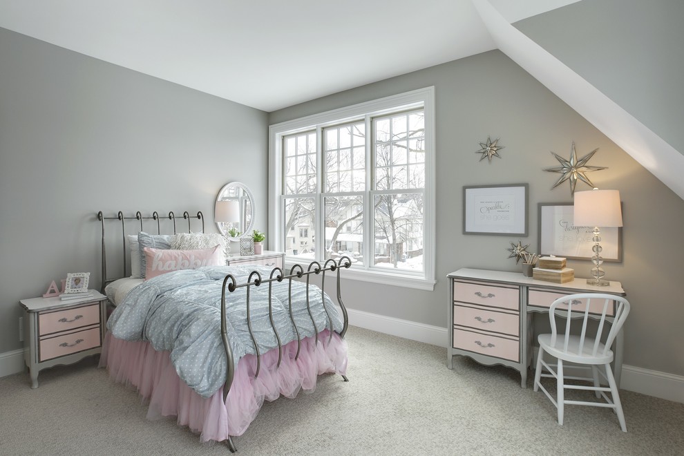 This is an example of a traditional kids' bedroom for girls in Minneapolis with grey walls and carpet.