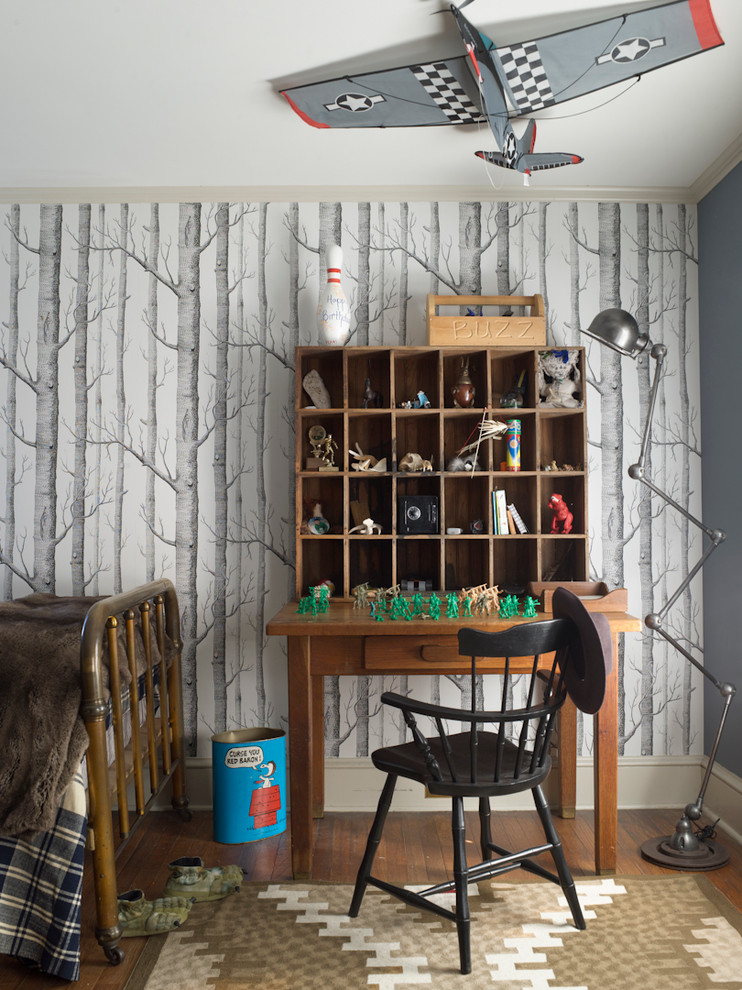 Kids' bedroom - country boy medium tone wood floor kids' bedroom idea in New York with gray walls