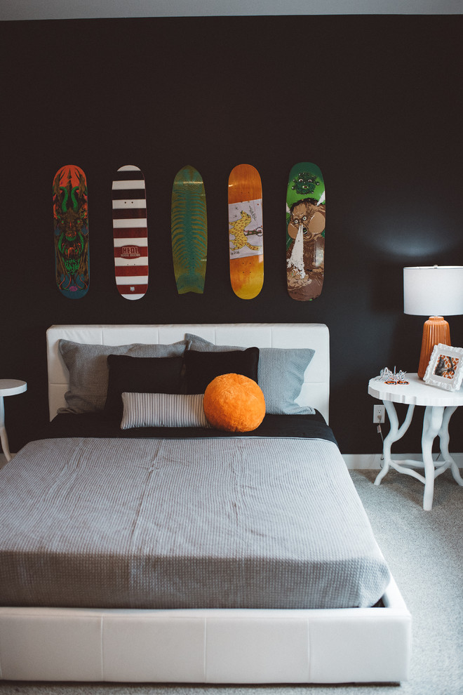 Design ideas for a medium sized modern teen’s room for boys in Edmonton with black walls, carpet and grey floors.