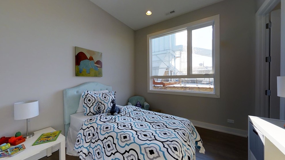 Example of a mid-sized trendy dark wood floor kids' bedroom design in Chicago with gray walls