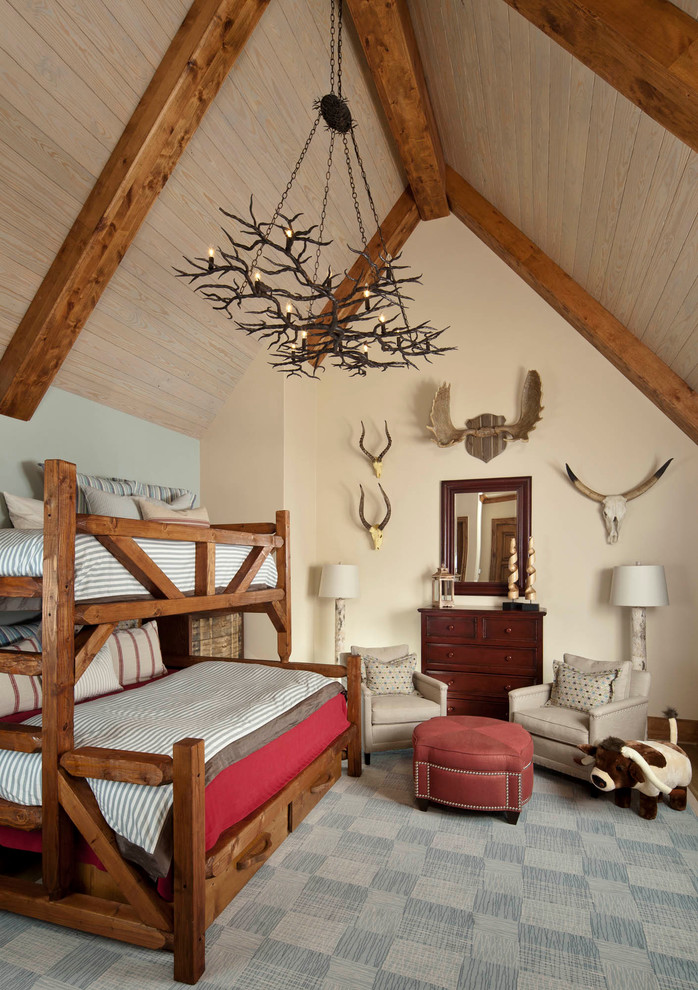 Idée de décoration pour une chambre d'enfant de 4 à 10 ans tradition avec un mur beige, un sol gris et un lit superposé.