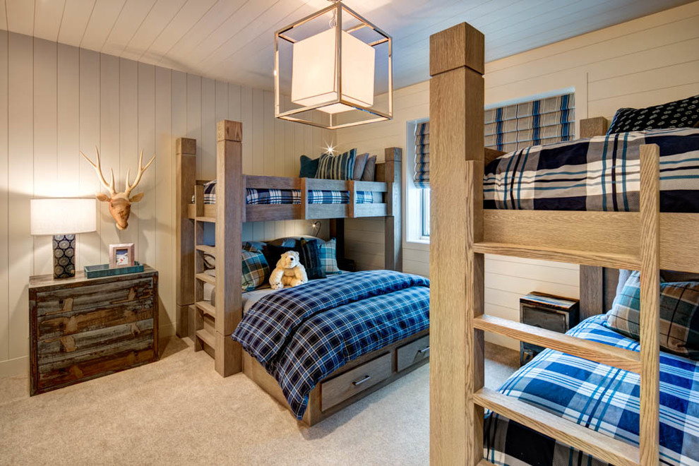This is an example of a large rustic children’s room for boys in Salt Lake City with white walls, carpet and beige floors.