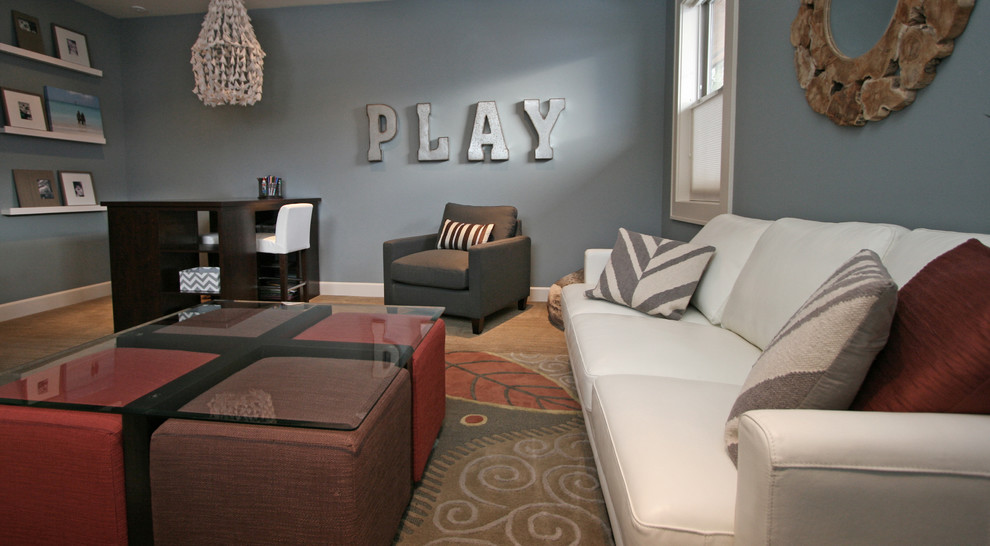 Kids' room - small contemporary gender-neutral carpeted kids' room idea in Seattle with blue walls