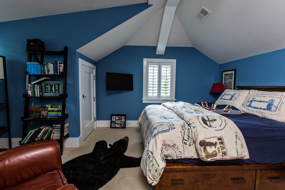 Immagine di una cameretta per bambini classica con pareti blu