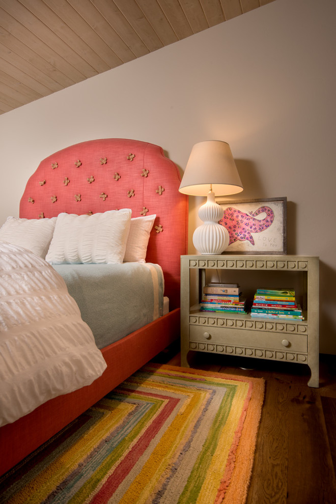 Inspiration for a rustic children’s room for girls in Boise with beige walls.