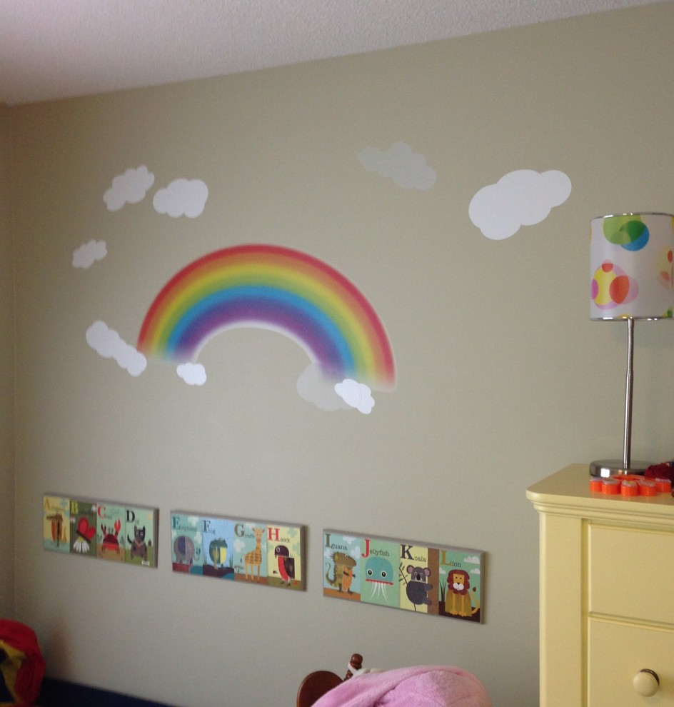 Photo of a traditional children’s room for girls in Other with beige walls and carpet.