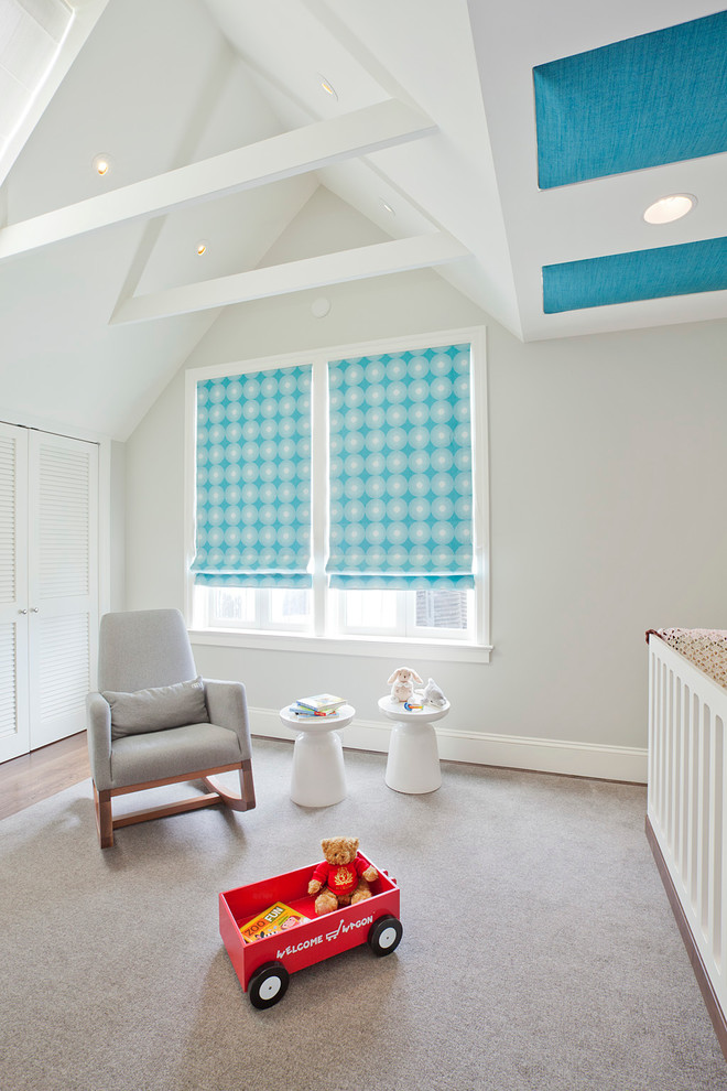 Example of a mid-sized minimalist boy carpeted kids' room design in San Francisco with gray walls