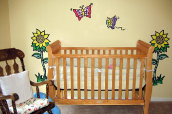 Immagine di una cameretta per neonati chic
