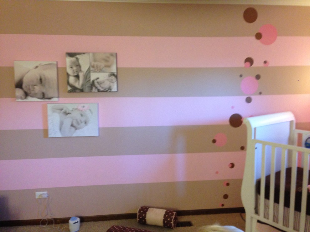 Mid-sized trendy girl kids' room photo with pink walls