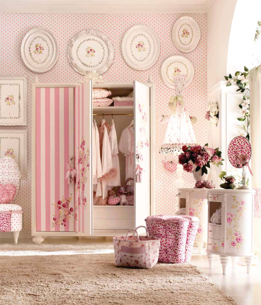 Design ideas for a large modern teen’s room for girls in London with pink walls and carpet.