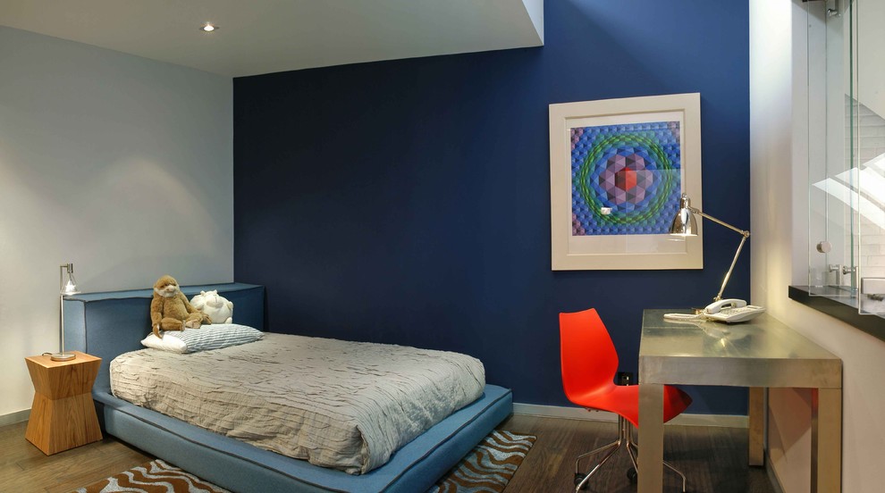 Foto de dormitorio infantil moderno con paredes azules