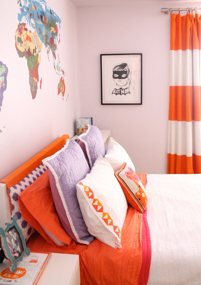 Example of a mid-sized eclectic girl carpeted kids' room design in Oklahoma City with purple walls