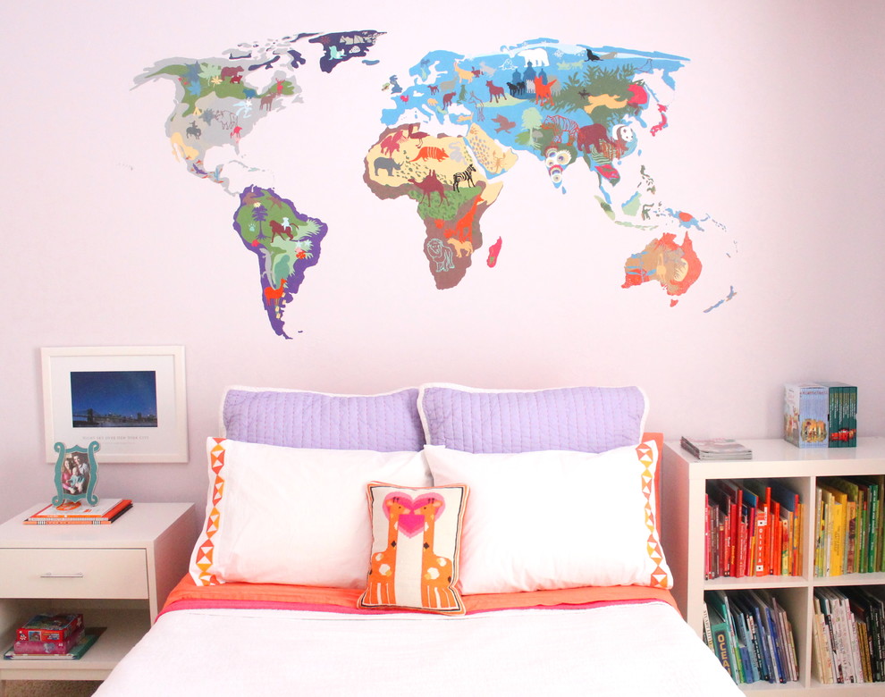 This is an example of a medium sized bohemian children’s room for girls in Oklahoma City with purple walls and carpet.