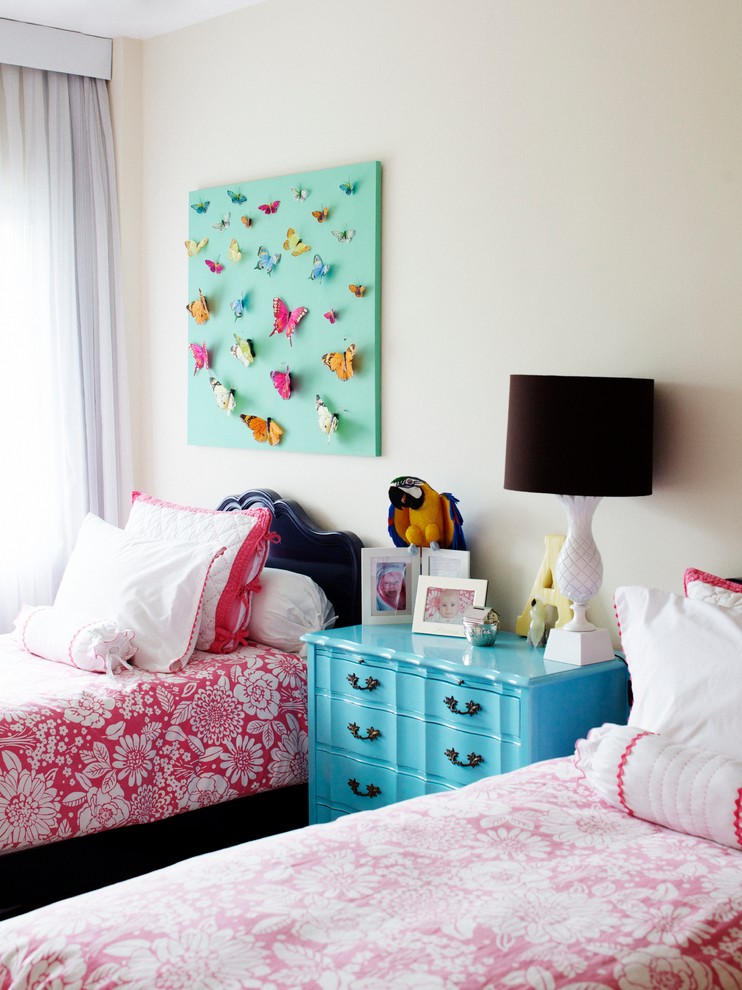 Example of a mid-sized transitional girl kids' room design in Austin with beige walls