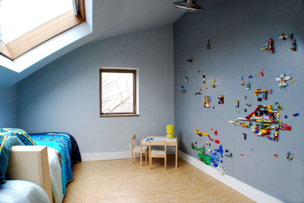 Kids' room - small modern gender-neutral cork floor kids' room idea in New York with gray walls