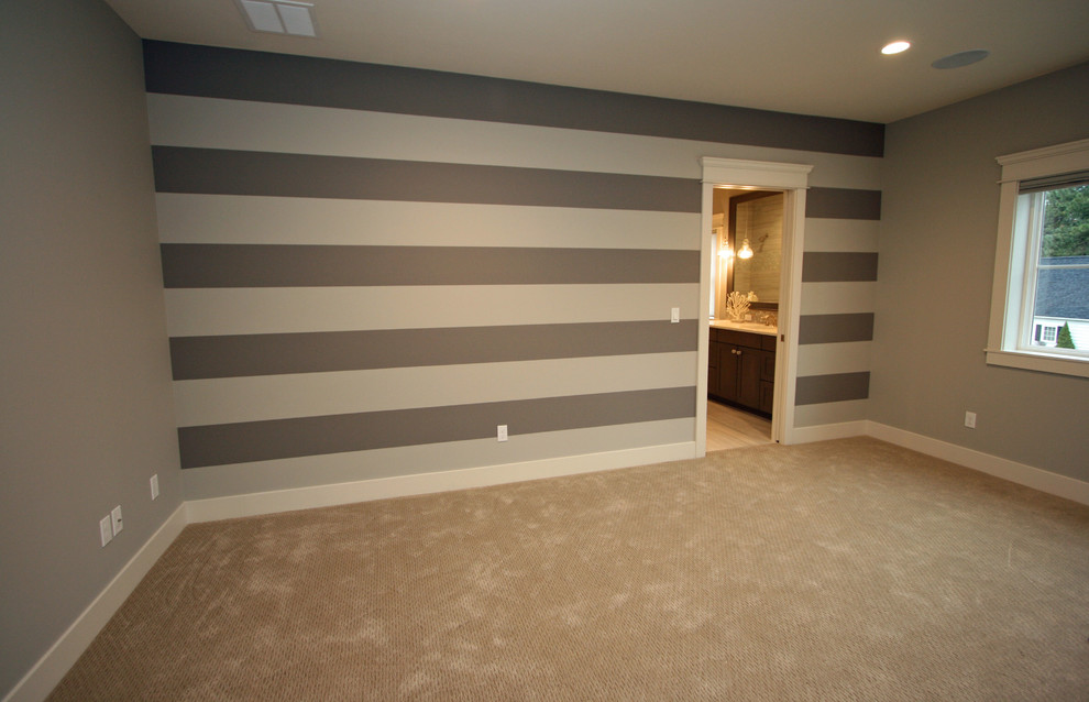 Example of a mid-sized classic gender-neutral carpeted kids' room design in Seattle with gray walls