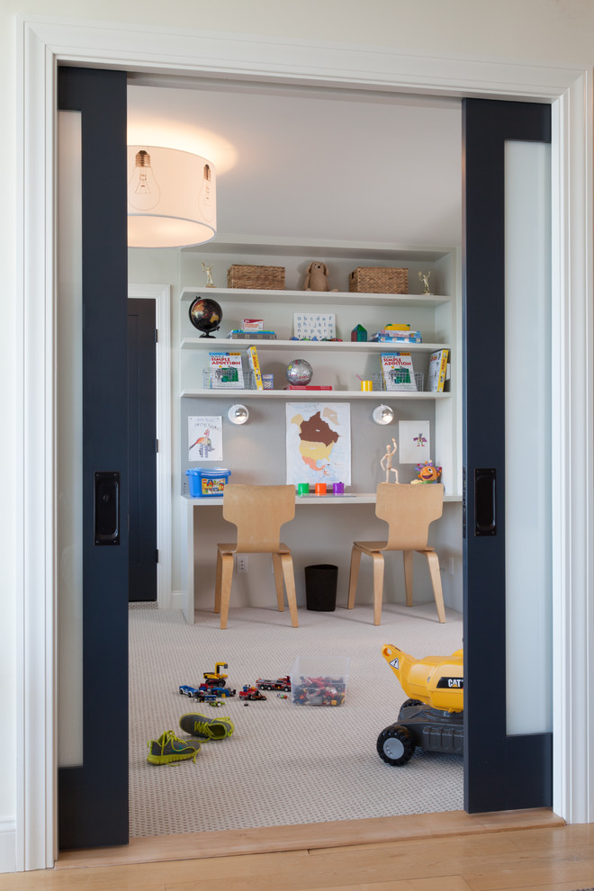 Inspiration for a transitional gender-neutral carpeted playroom remodel in Boston with gray walls