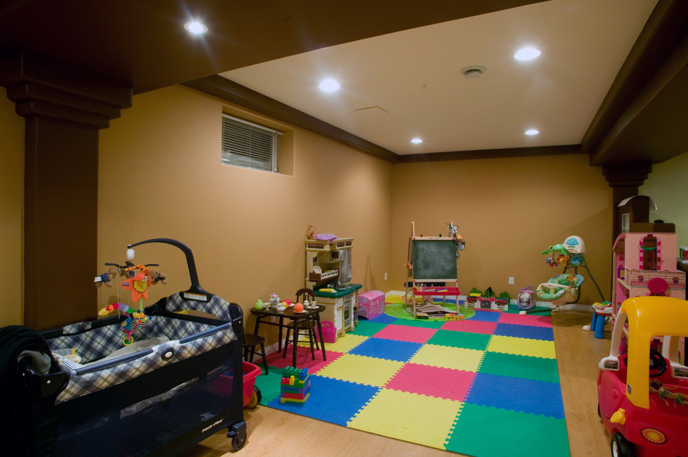 Inspiration for a large contemporary light wood floor kids' room remodel in Other with beige walls