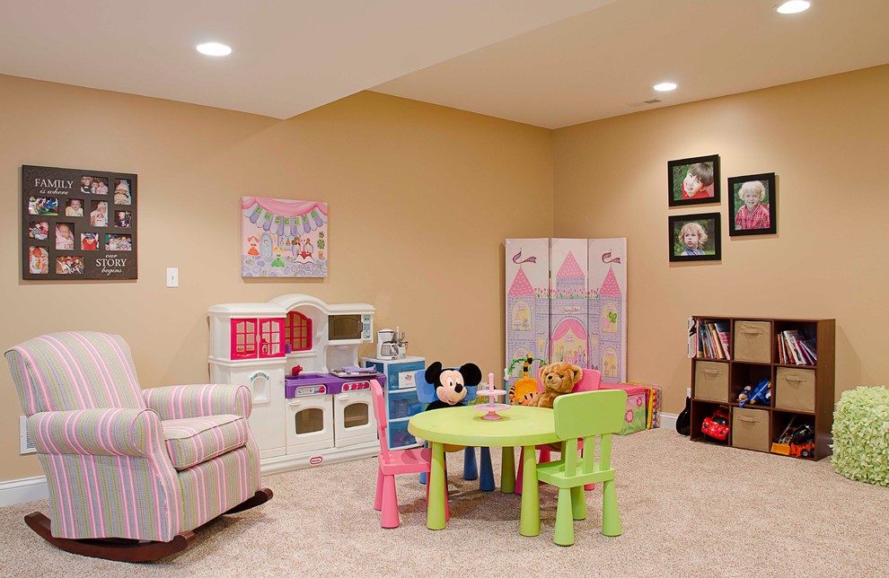 Example of a mid-sized classic gender-neutral carpeted kids' room design in Chicago with beige walls